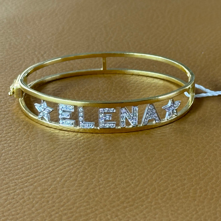 Bracelet en or jaune et diamants avec écriture ELENA