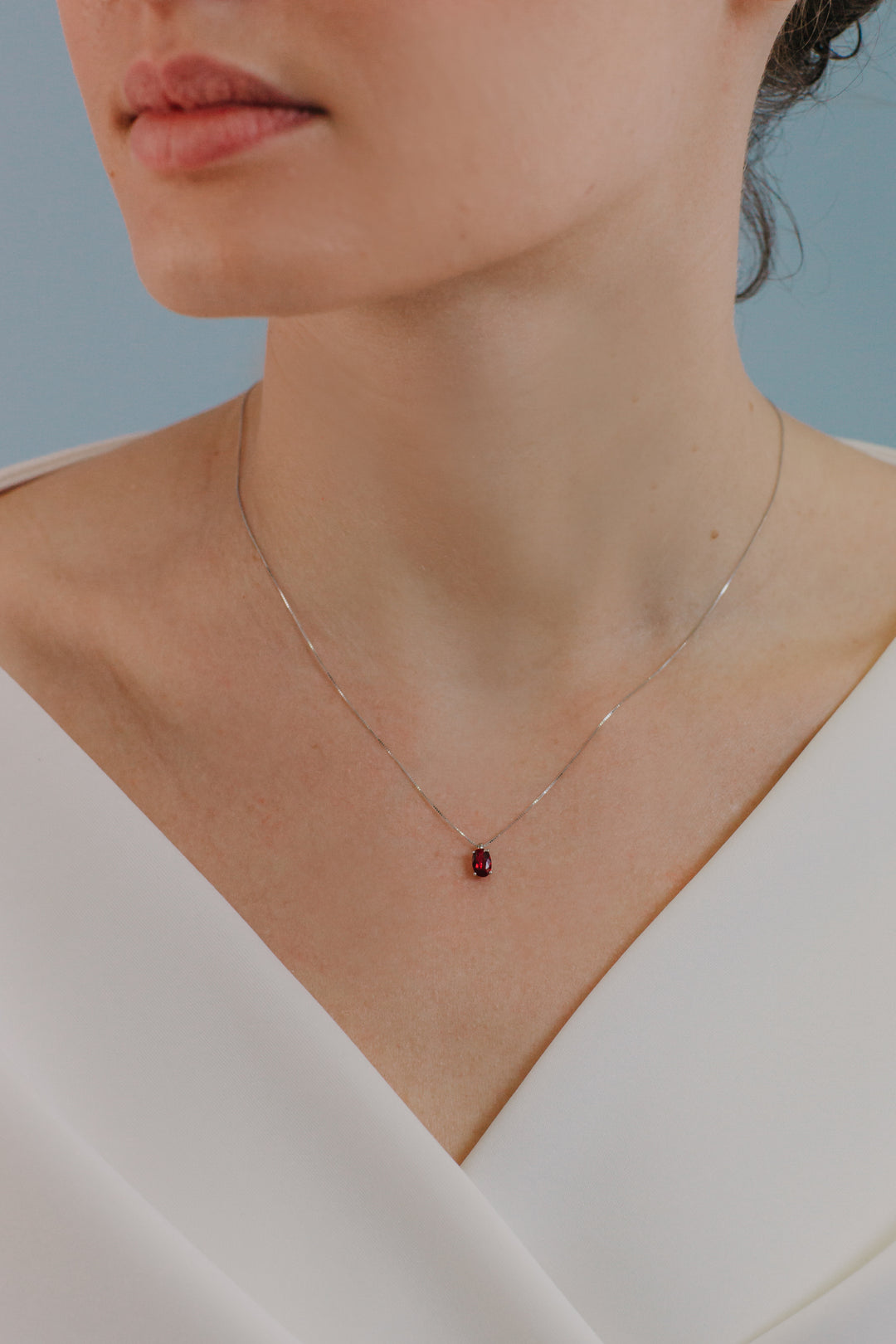 Comete ovale gouden en robijnrode ketting GLB1619