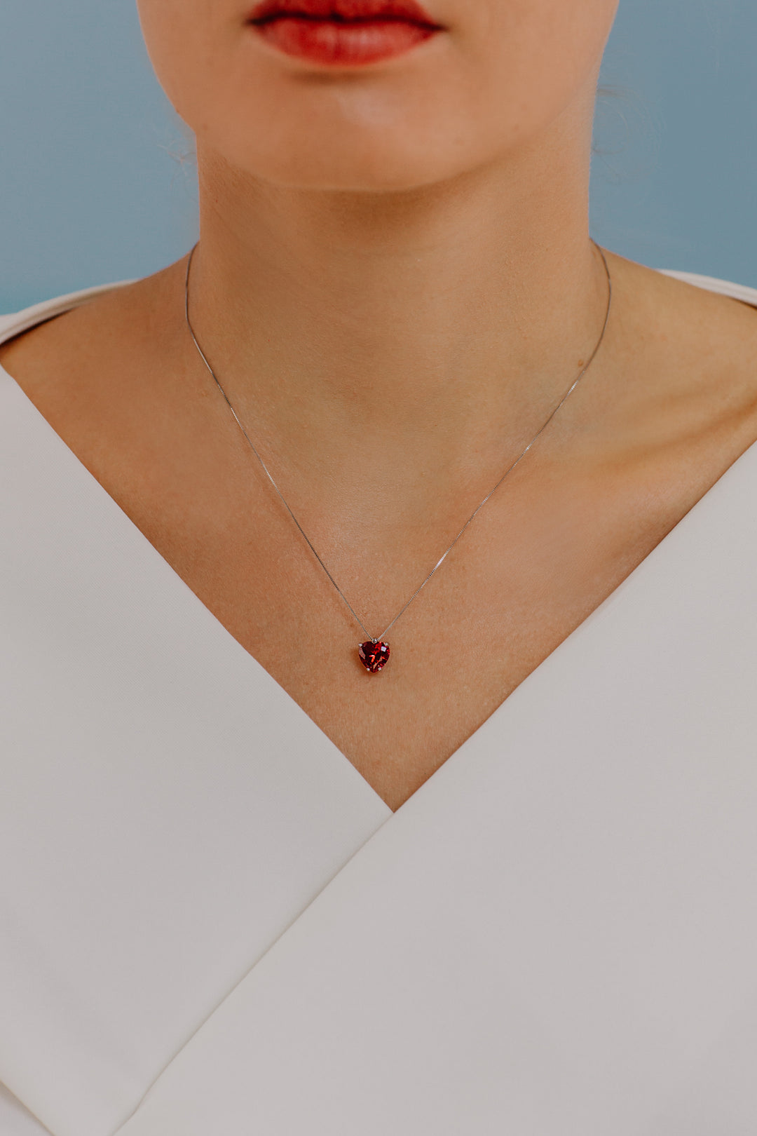 Comete gouden en robijnrode hartketting GLB1429
