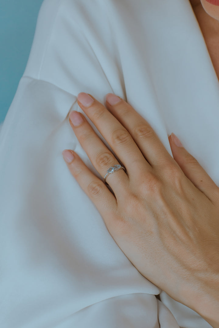 Comete-Goldring mit Diamanten und Aquamarin-Tropfen ANQ328