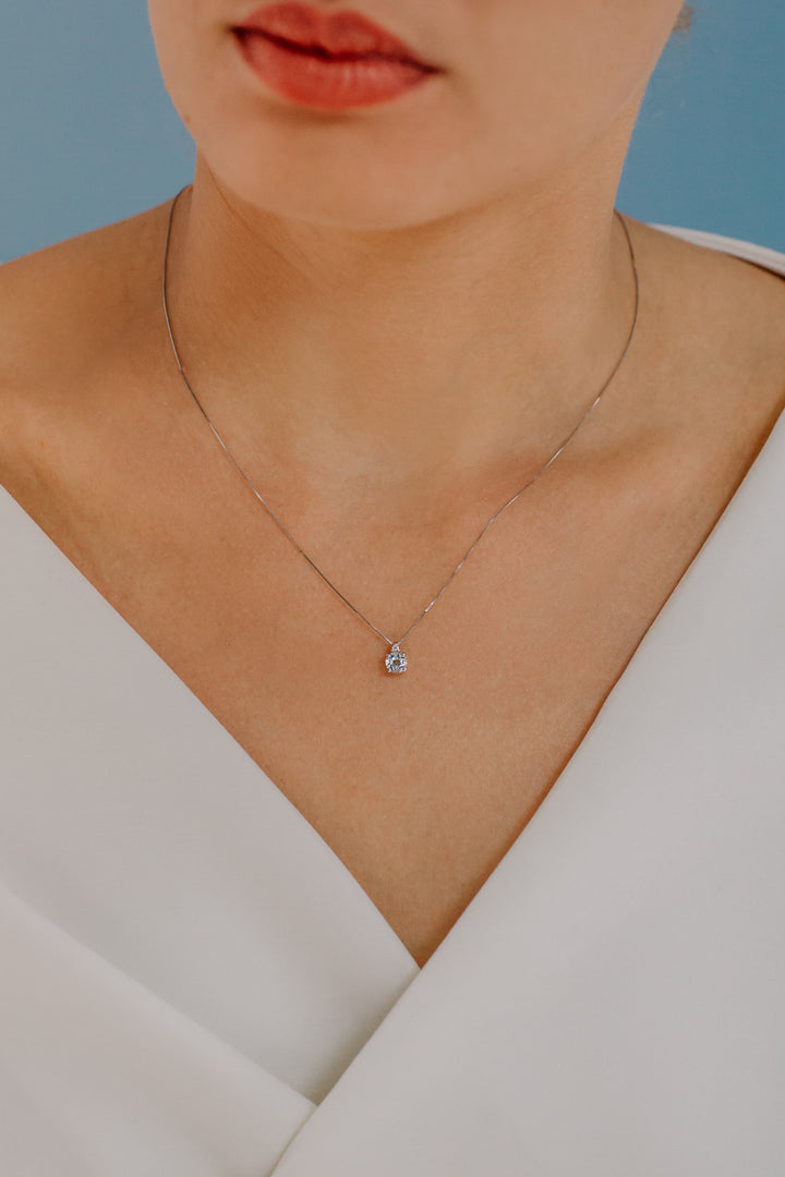Comete ketting in goud, diamanten en rond aquamarijn GLB1383