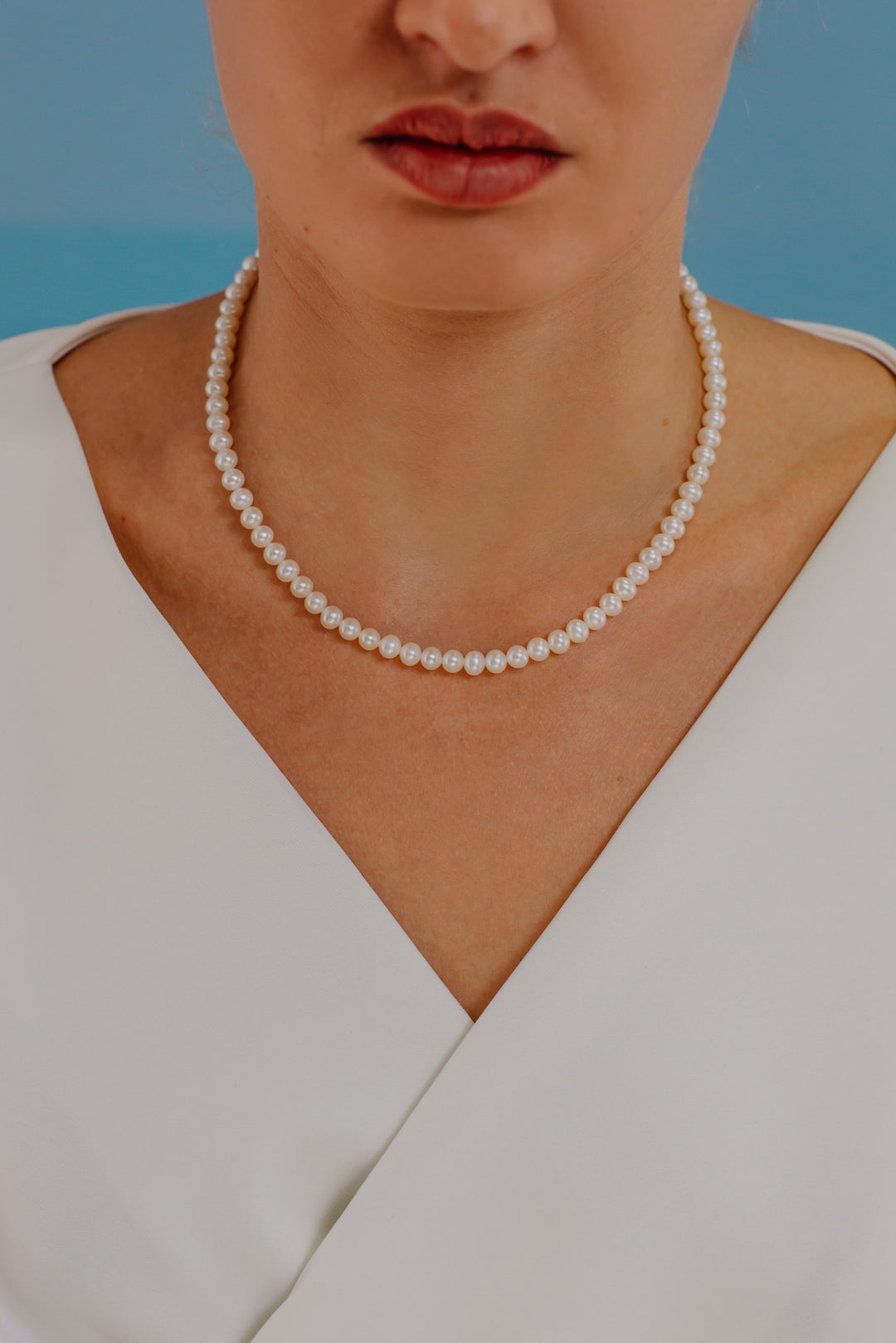 Comete choker ketting met zoetwaterparels in goud FWQ106AM50