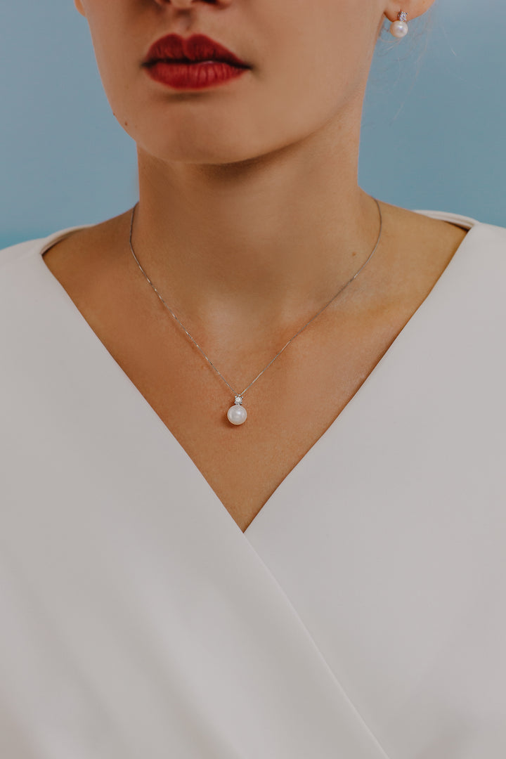 Comete ketting Pearl lichtpunt in goud en diamant GLP595