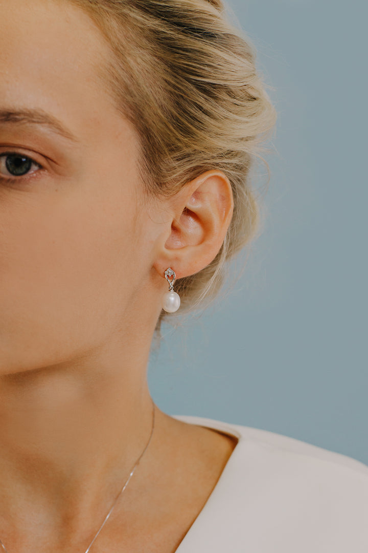 Comete pareloorbellen in goud en diamanten ORP715