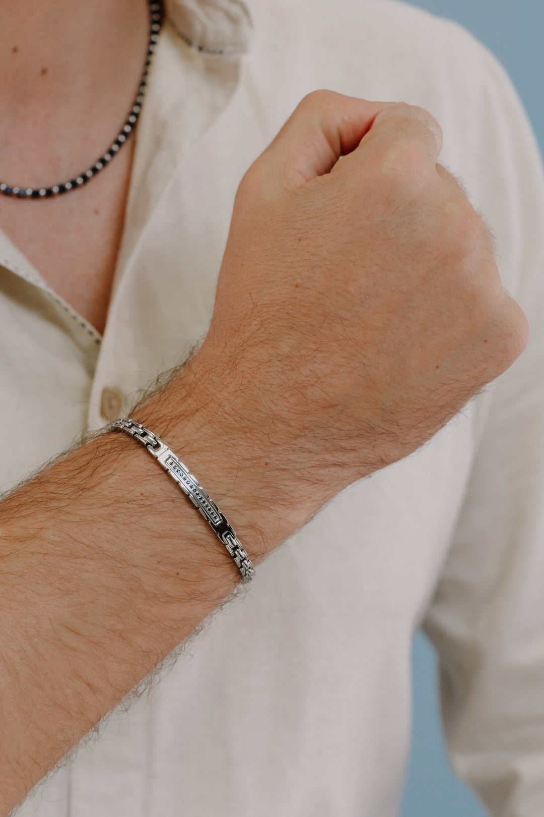Comete-armband van gepolijst staal en zwarte zirkonen UBR974