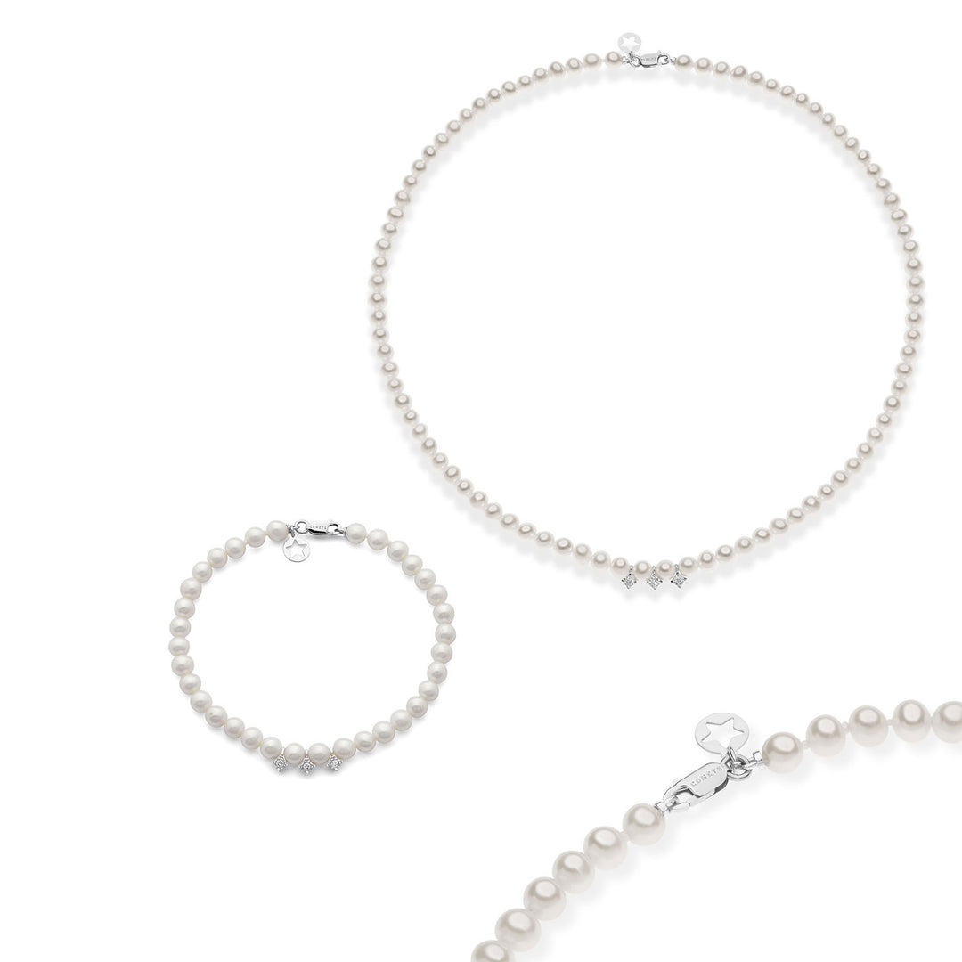 Comete choker en armband in goud en parels met witte diamanten KIT321369