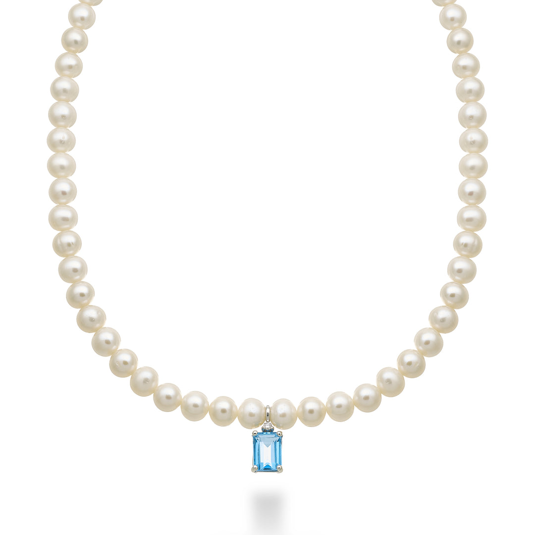 Nihama cl 18k fw 5,5/6 blauer Schweizer Topas Okt. 6x8 ct.2,10 Durchm. 0,02 ct Federring NC1575O4TPSW55