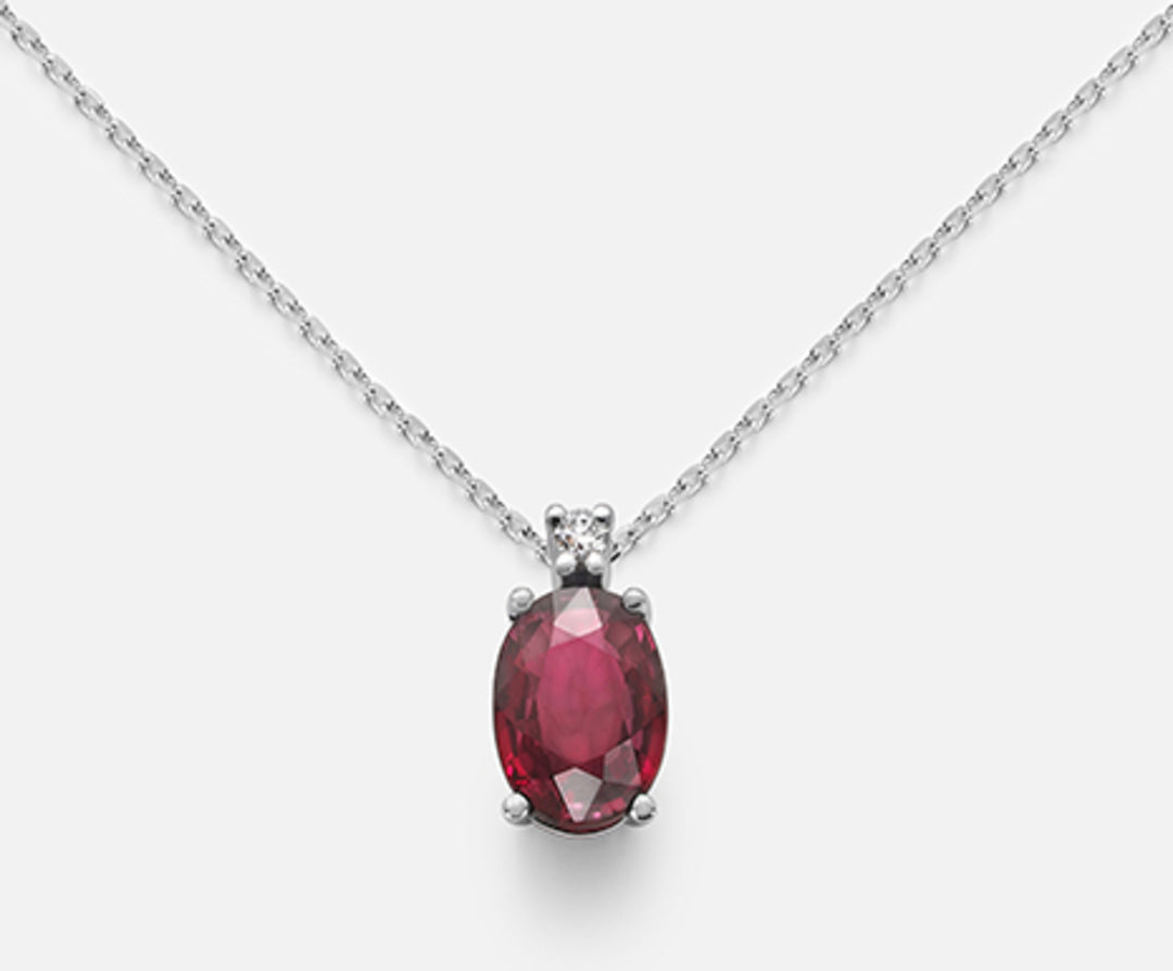Nihama cl 9k ruby ​​n. oval 7x5 ct.0.80 diam. ct.0,015 ND5035R4RBN080