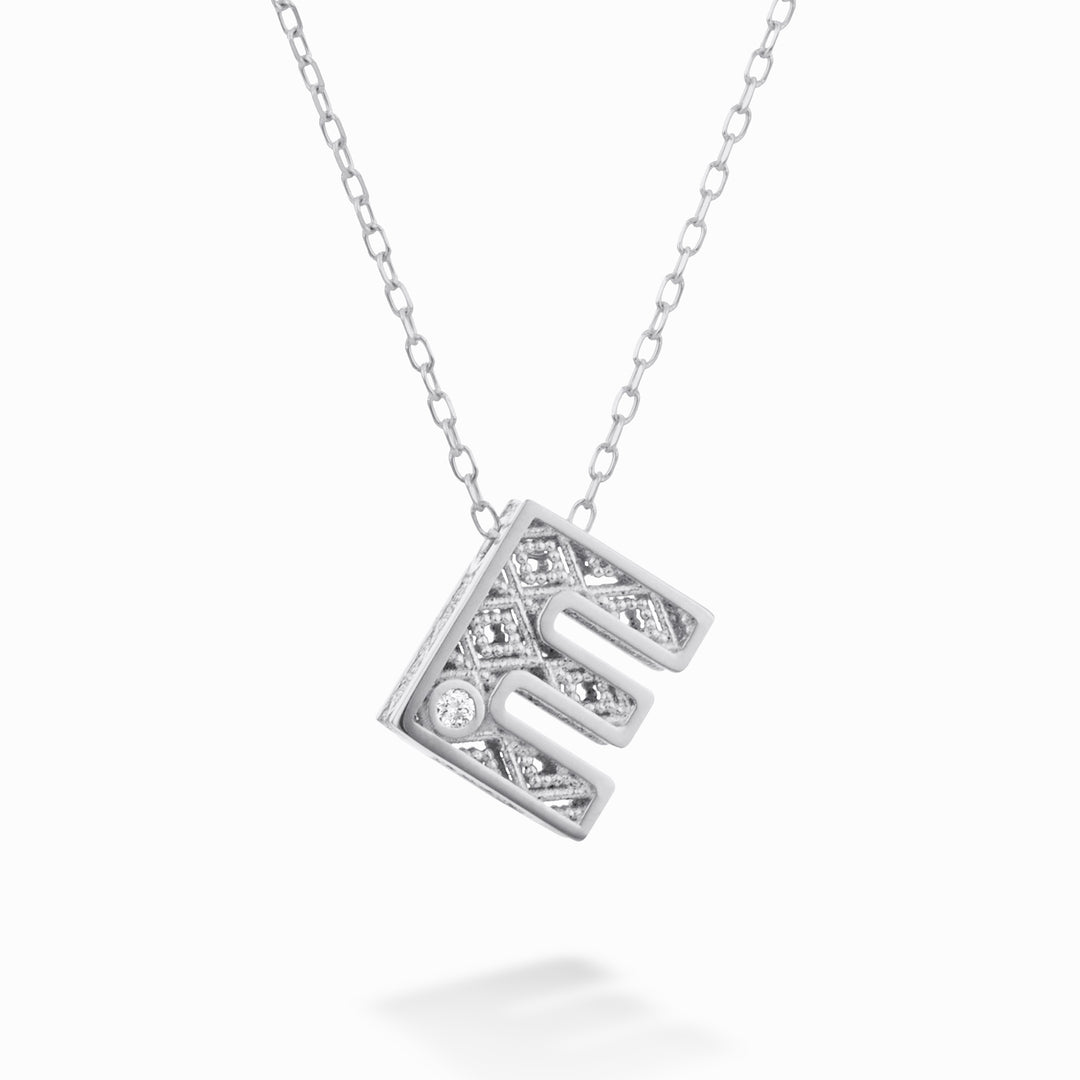 Nihama cl 18k lettre e or blanc diam. ct.0,01 NDLETEO4
