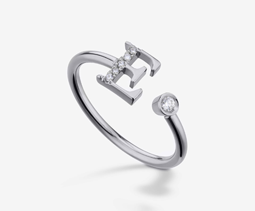 Golay une lettre e 9k grand diamètre en or blanc. ct.0.06 GAFED2R4