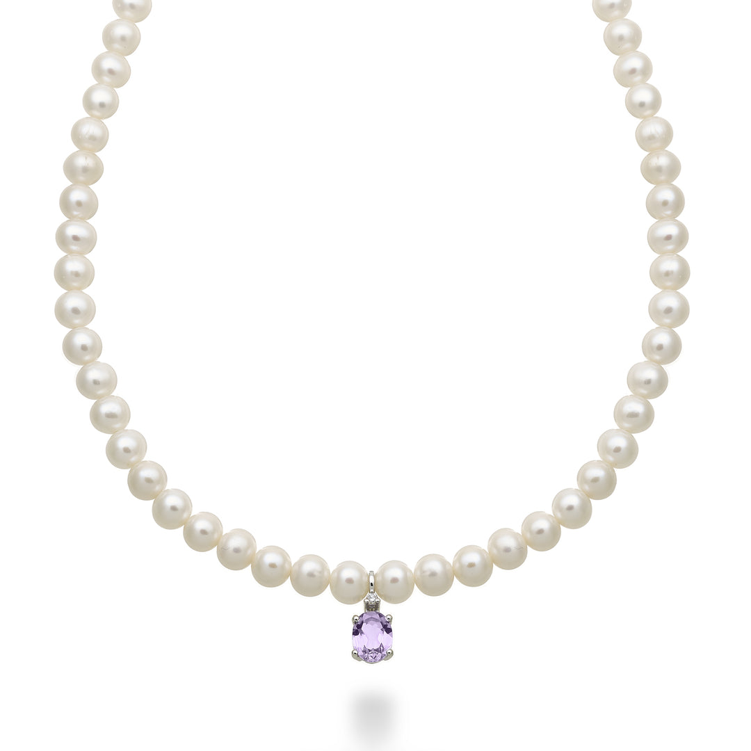 Nihama cl 18k fw 5,5/6 ovale amethist 6x8 ct.1,10 diam. Veerring van 0,02 ct NC1576O4AMET55