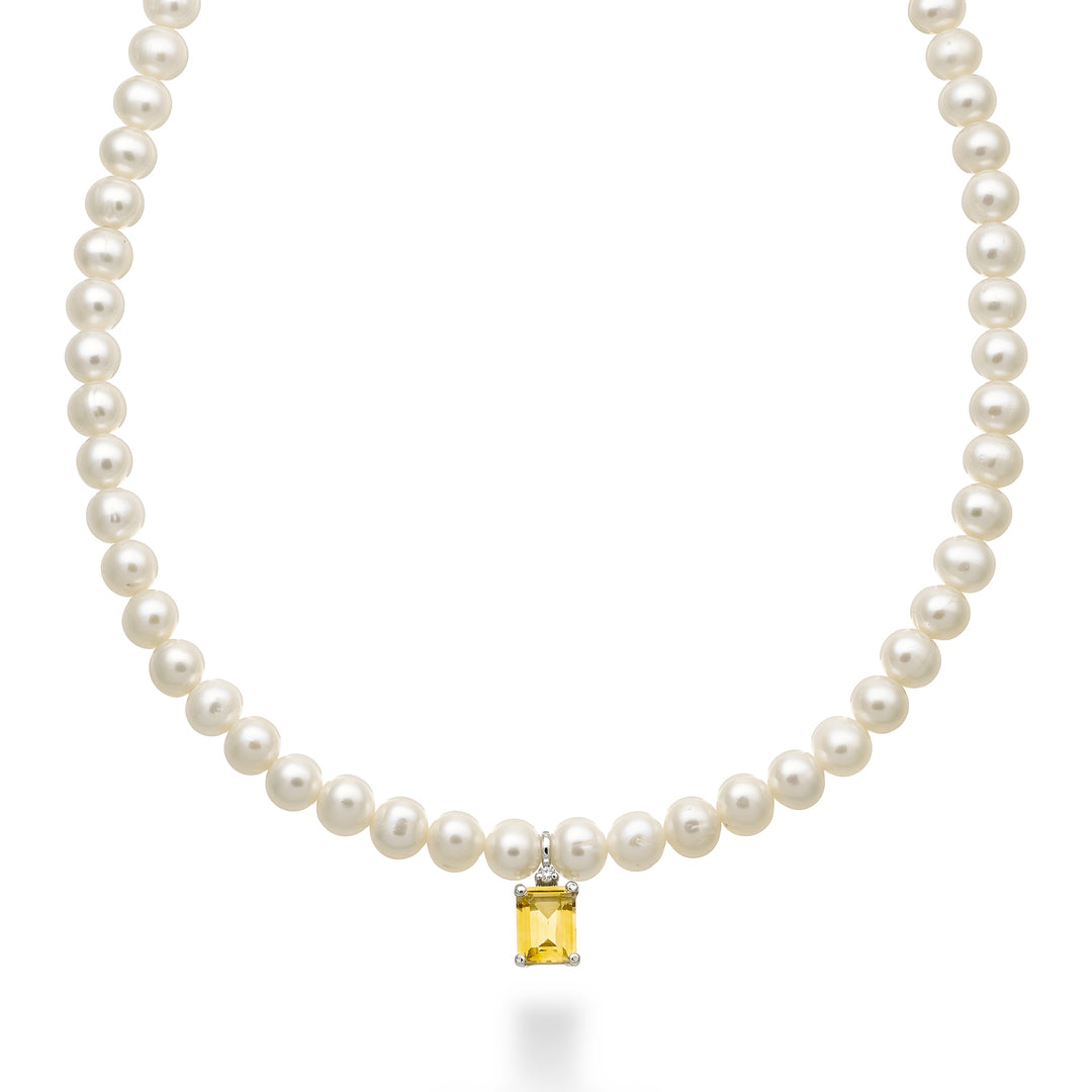 Nihama cl 18k fw 5,5/6 citrien okt. 6x8 ct. 1,30 diam. Veerring van 0,02 ct NC1575O4CITR55