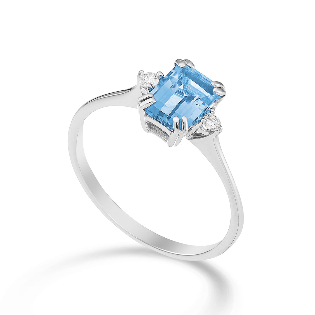 Nihama une topaze bleue octogonale 18 carats 7x5 ct.1,20 diam. ct.0,05 NACL090DITPAZ2O4