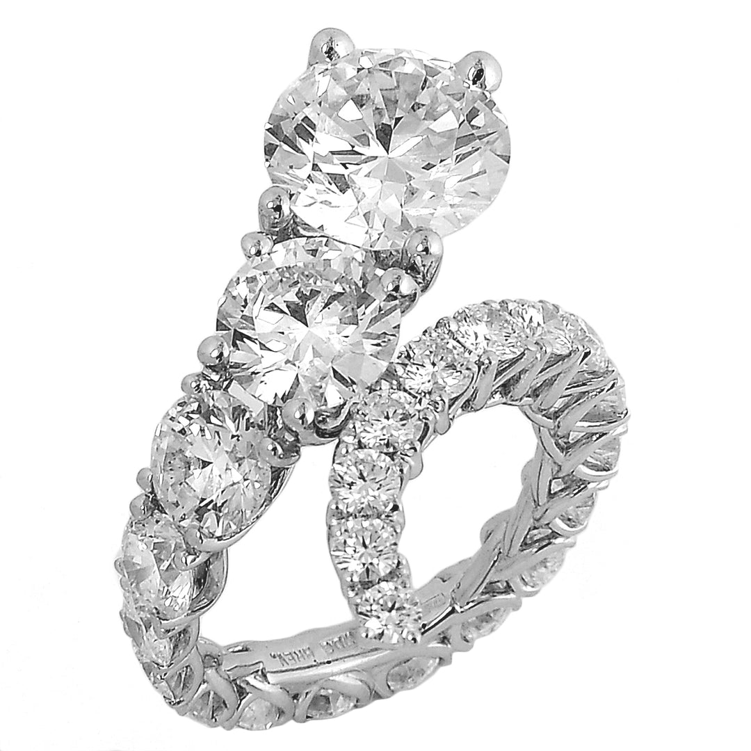 Nihama an 18kt lab g.d. central 0.70 total ct. 3.00 snake NXDABTRE1867BI310
