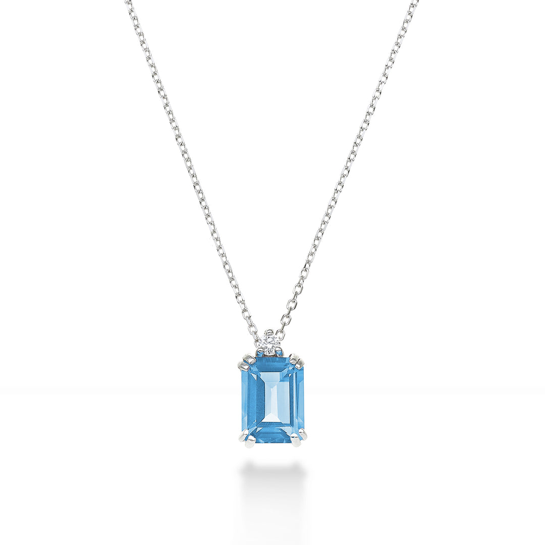 Nihama cl 18k octagonal blue topaz 7x5 ct.1,20 diam. ct.0,025 NPCL090DITPAZ2O4