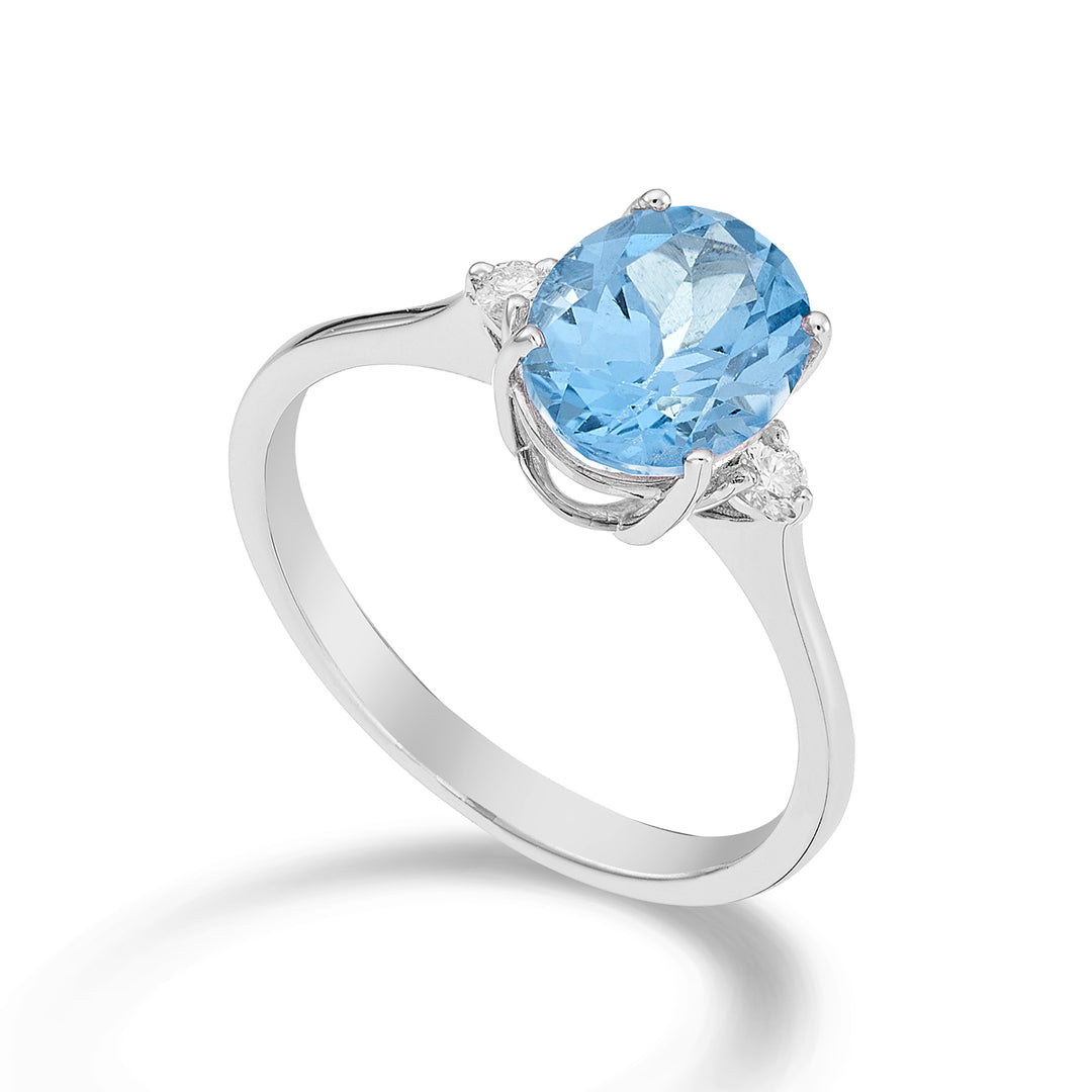 Mikiko une topaze bleue ovale 18 carats 7x9 ct.2,10 diam. ct.0,08 MA5143O4TPAZ