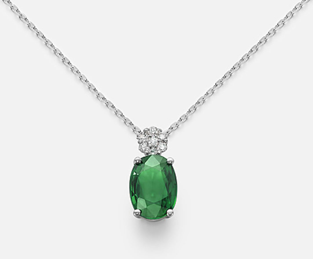Nihama cl 18k ovaler Smaragd 7x5 ct.0,60 Durchm. ct.0,045 ND5025O4BE