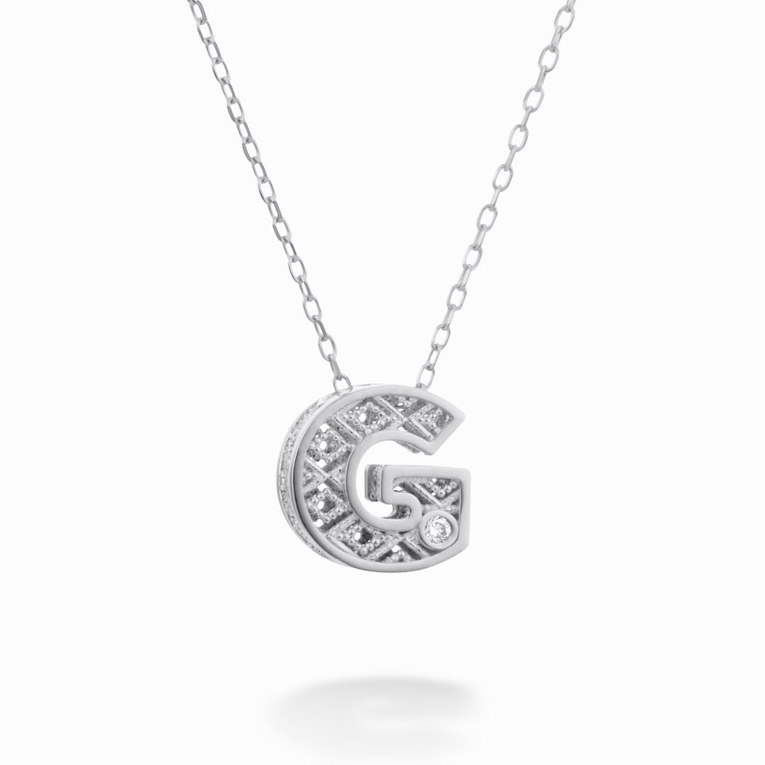 Nihama cl 18k letter g witgoud diam. ct.0,01 NDLETGO4