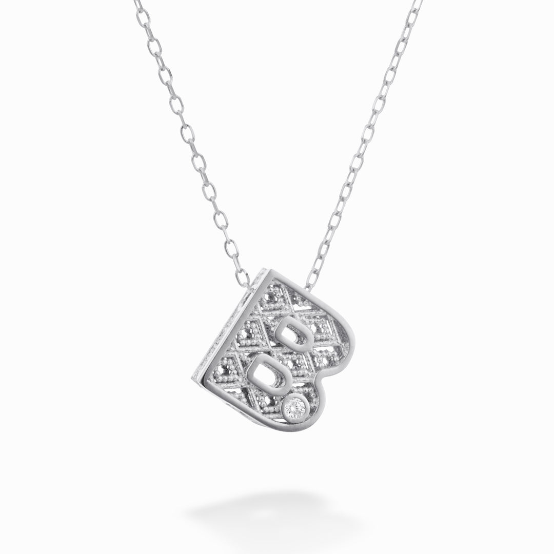 Nihama cl 18k letter b witgoud diam. ct.0,01 NDLETBO4