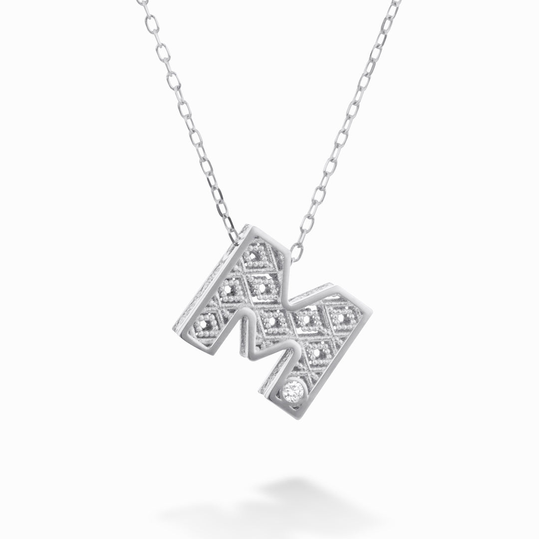 Mikiko cl 18k letter m witgoud diam. ct.0,01 MDLETMO4