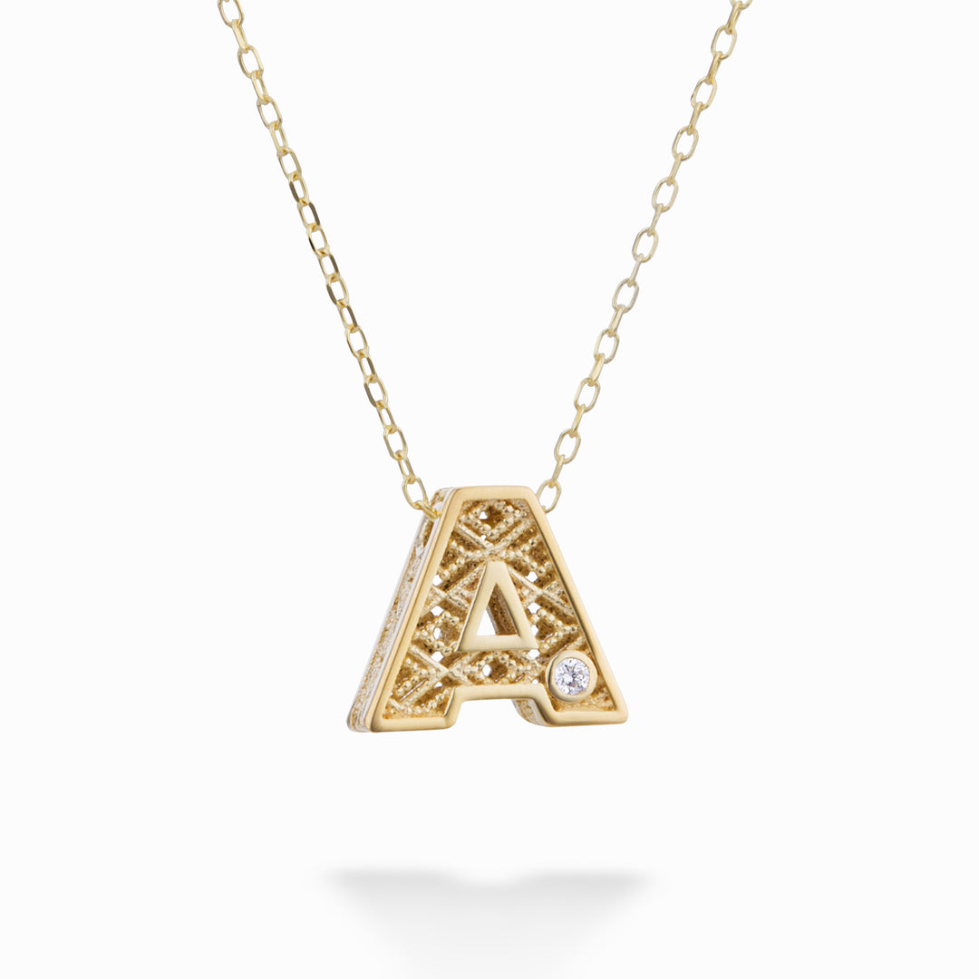 Nihama cl Lettre en or jaune 18 carats diam. ct.0,01 NDLETAO1