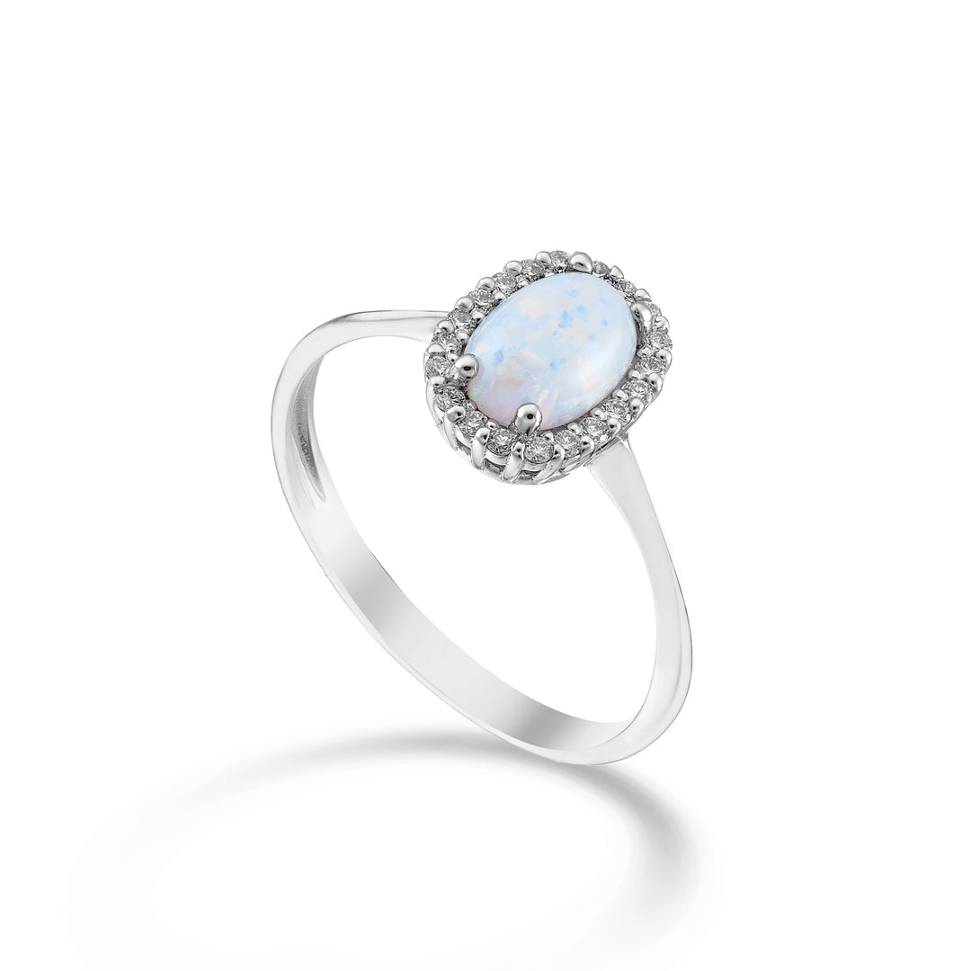 Nihama an 18k opal cabochon oval 7x5, with diamond outline NA5207O4OP